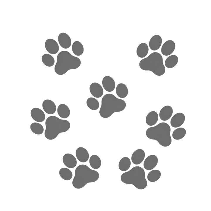 ちらばる猫のグレーの足あとのイラスト（肉球・透過PNG）